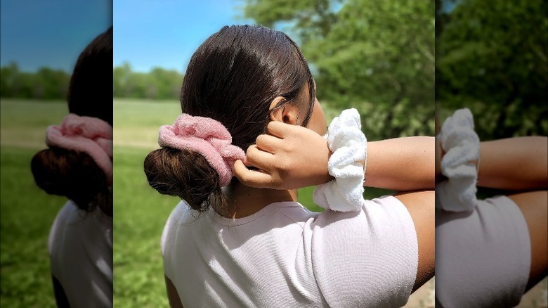 woman using towel scrunchie