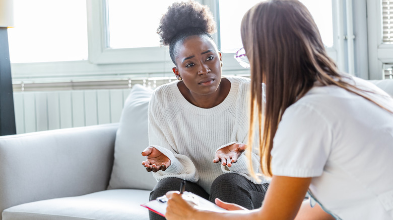 Woman talking with therapist