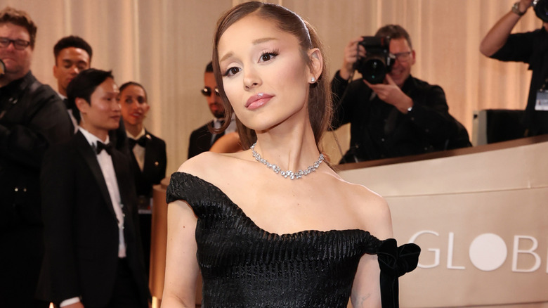 Ariana Grande wearing a black dress at the 2026 Golden Globes