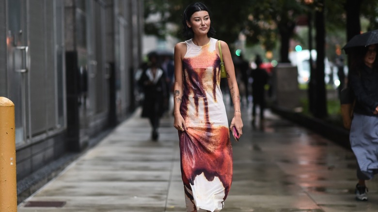 woman with brown and white dress