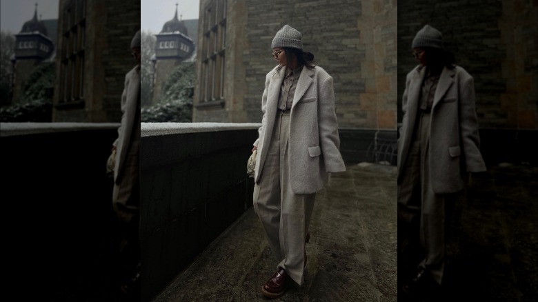 Girl wearing penny loafers with trousers