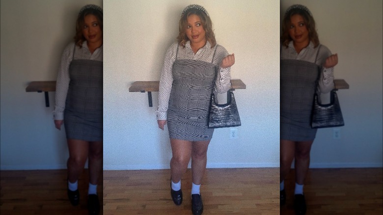 Girl wearing loafers with a dress