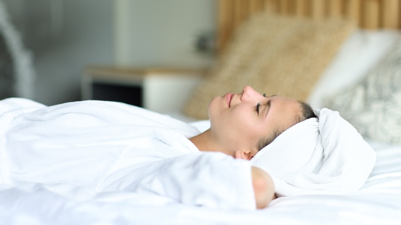 woman sleeping on bed