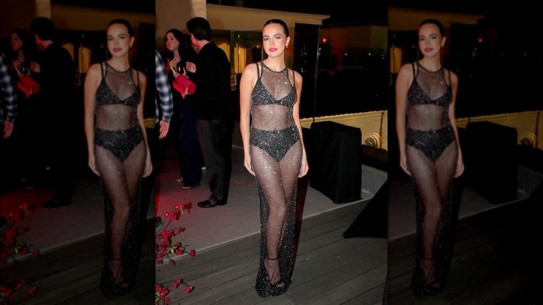 Bailee Madison in a black bikini and cover up