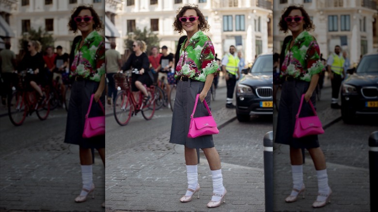 woman wearing pink ballet pumps