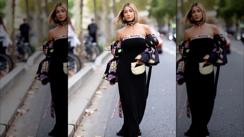 Woman wearing off-the-shoulder dress