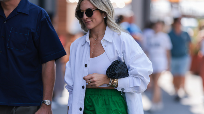 woman wearing gold bracelets