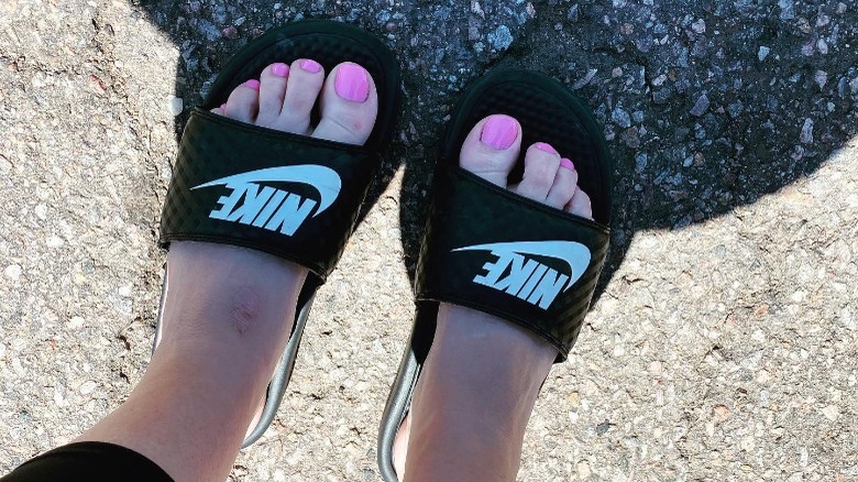 Person with Barbie pink pedicure