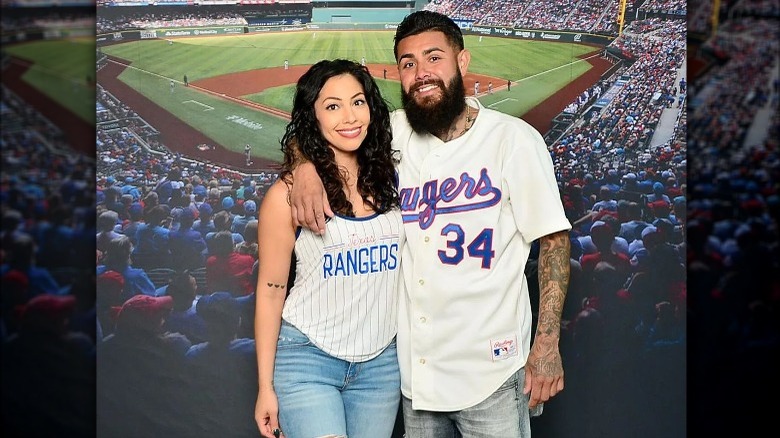 Woman in baseball jersey as a tank top
