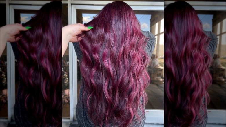 A woman with maroon highlights