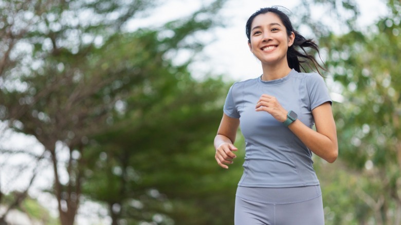 Woman running in a park