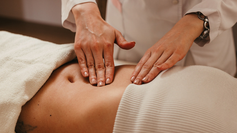 woman getting abdominal massage