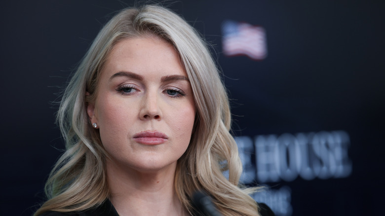Karoline Leavitt wearing a black blazer during a White House meeting