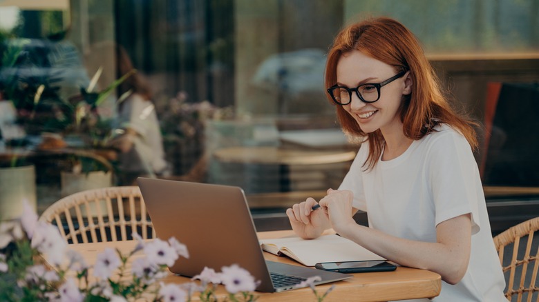 Woman does research on laptop 