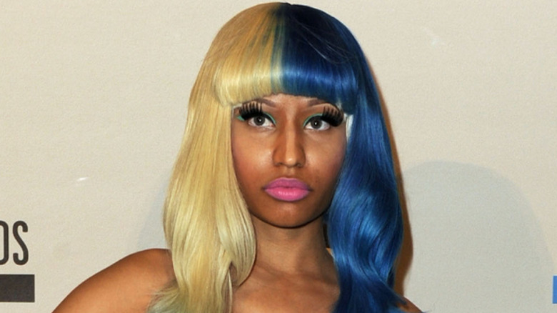 Nicki Minaj in a blond and blue wig