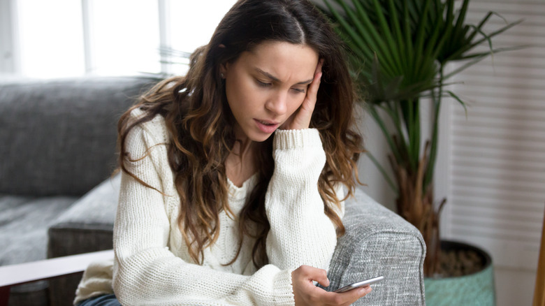 stressed woman with phone