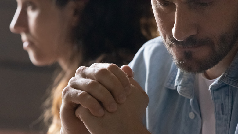 couple not looking at each other