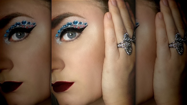 woman with bejeweled cut crease makeup