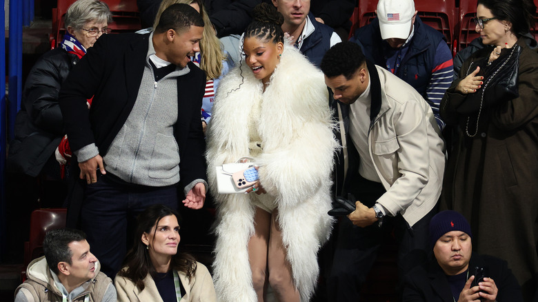 Halle Bailey sits in the audience watching the 2026 Olympic games