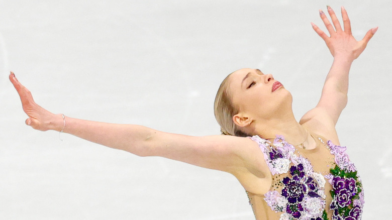 Kimmy Repond figure skates at the 2026 Winter Olympics