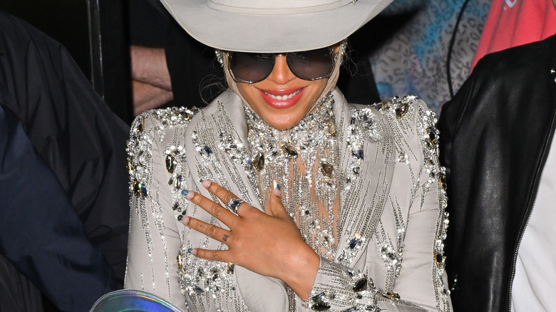 Beyoncé turquoise country French manicure