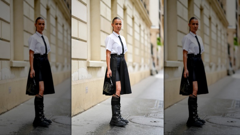 woman wearing mid-calf biker boots