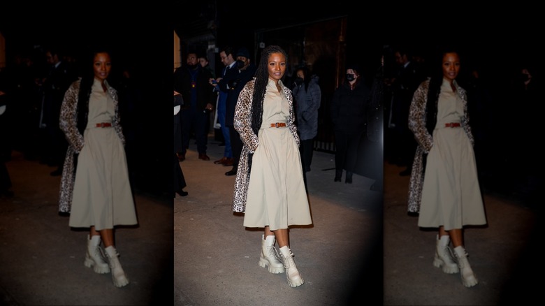 woman wearing white combat boots