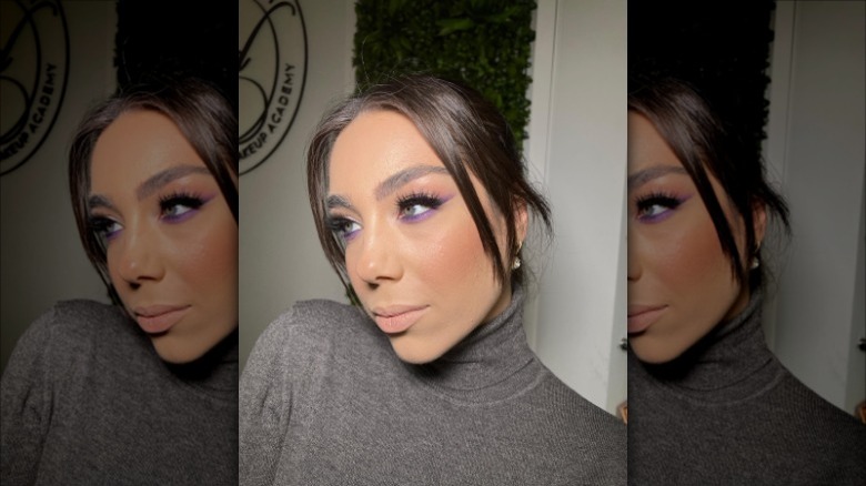 woman with purple eyeliner