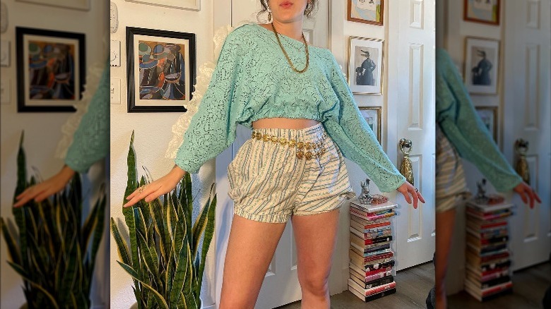 woman wearing striped bloomer aqua blouse