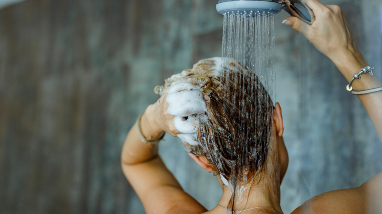 A woman washing her hair