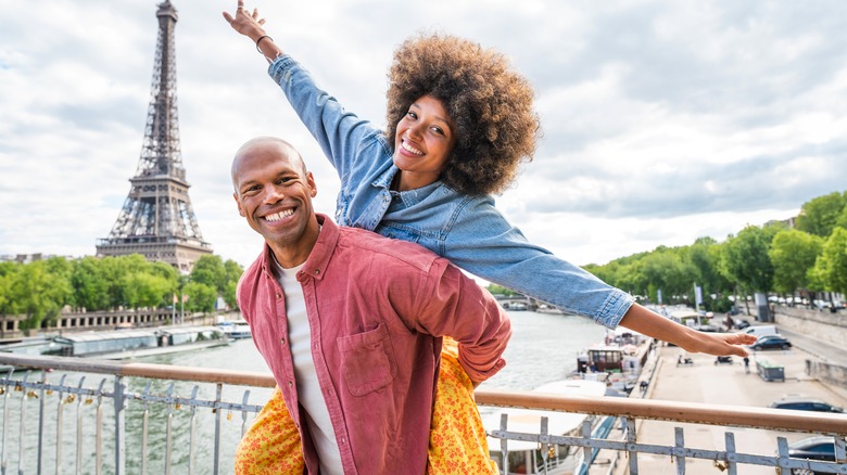 A woman on a man's back