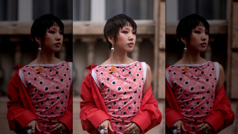woman in patterned boat neck top