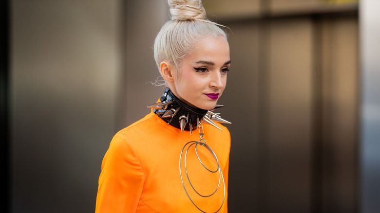 woman wearing statement necklace