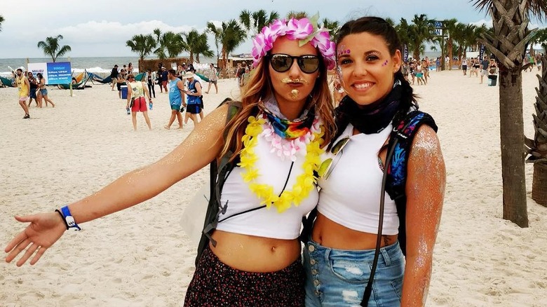 women with arm body glitter