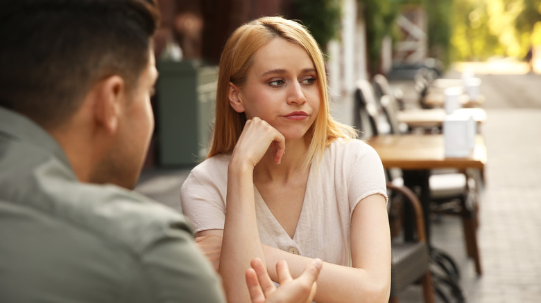 Bored woman at restaurant