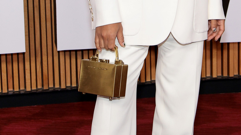 Man carrying a micro-trunk