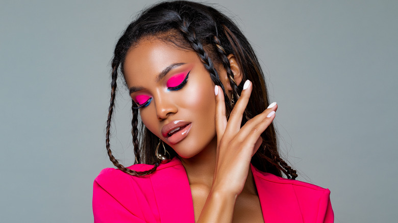 person with accent braids