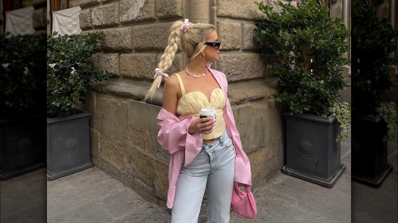 Feminine pink and yellow outfit with braided hair