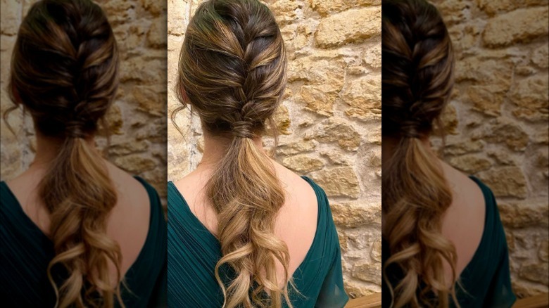 A woman with a French braid ponytail