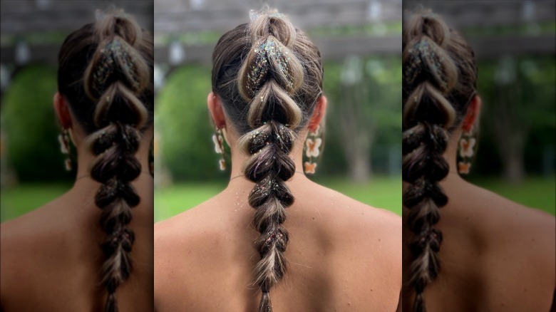 A woman with a glitter braid
