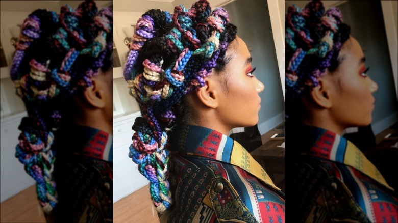 A woman with tied up braids