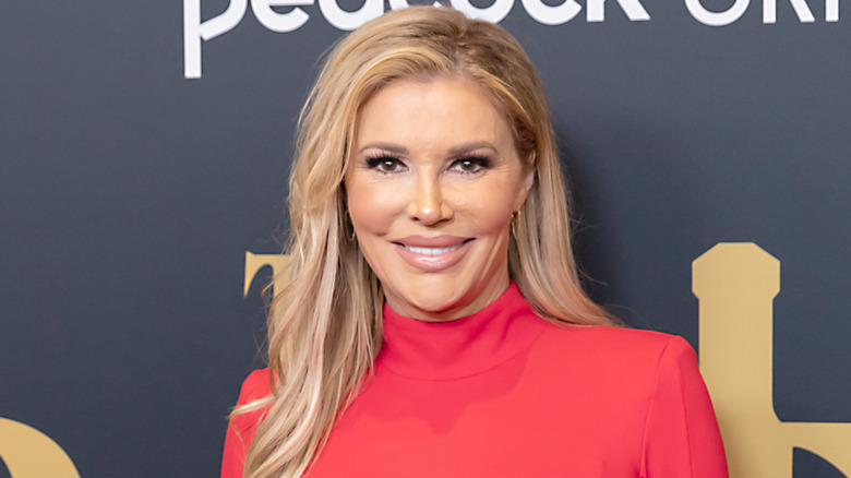 Brandi Glanville wearing a bright pink dress