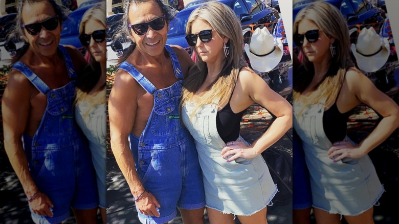 Brandi Passante wearing light-wash denim overalls over a black top and sunglasses