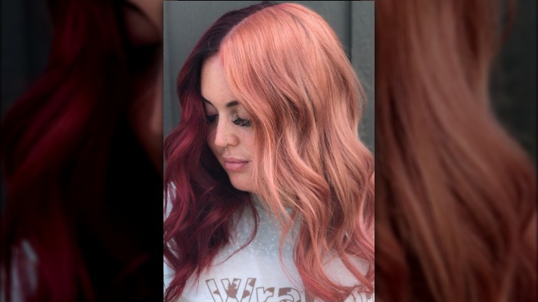 A woman with hair colored in two tones