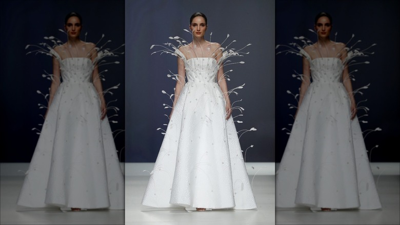 Woman in a feathered gown