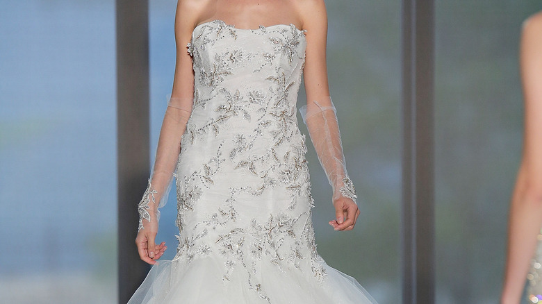 Bridal gown with sheer tulle gloves