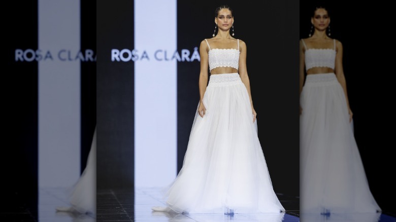 Bridal model wearing two-piece dress