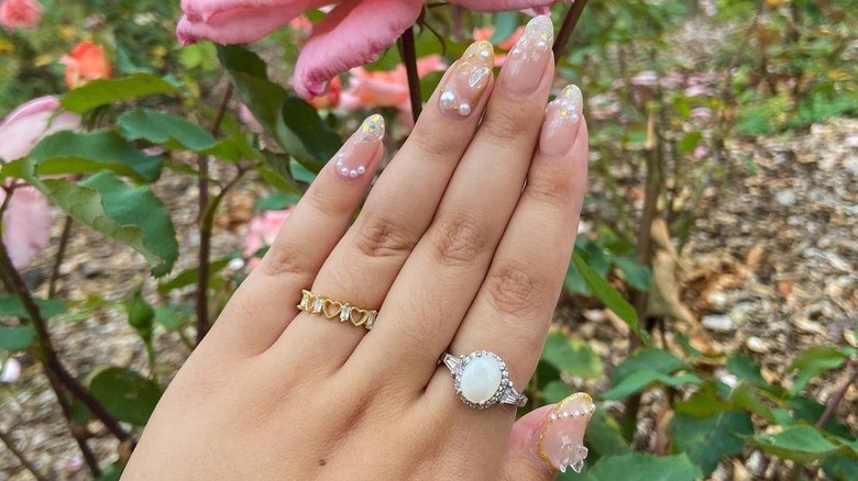 Pearls and butterflies manicure