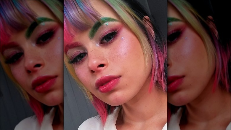 person with different-colored eyebrows