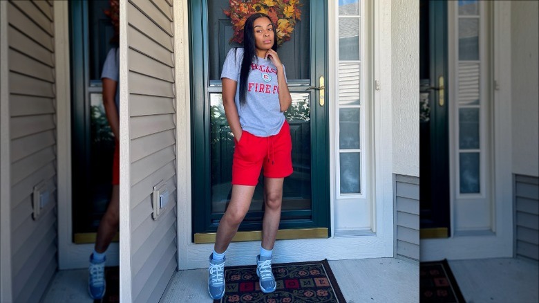 woman wearing red sweat shorts